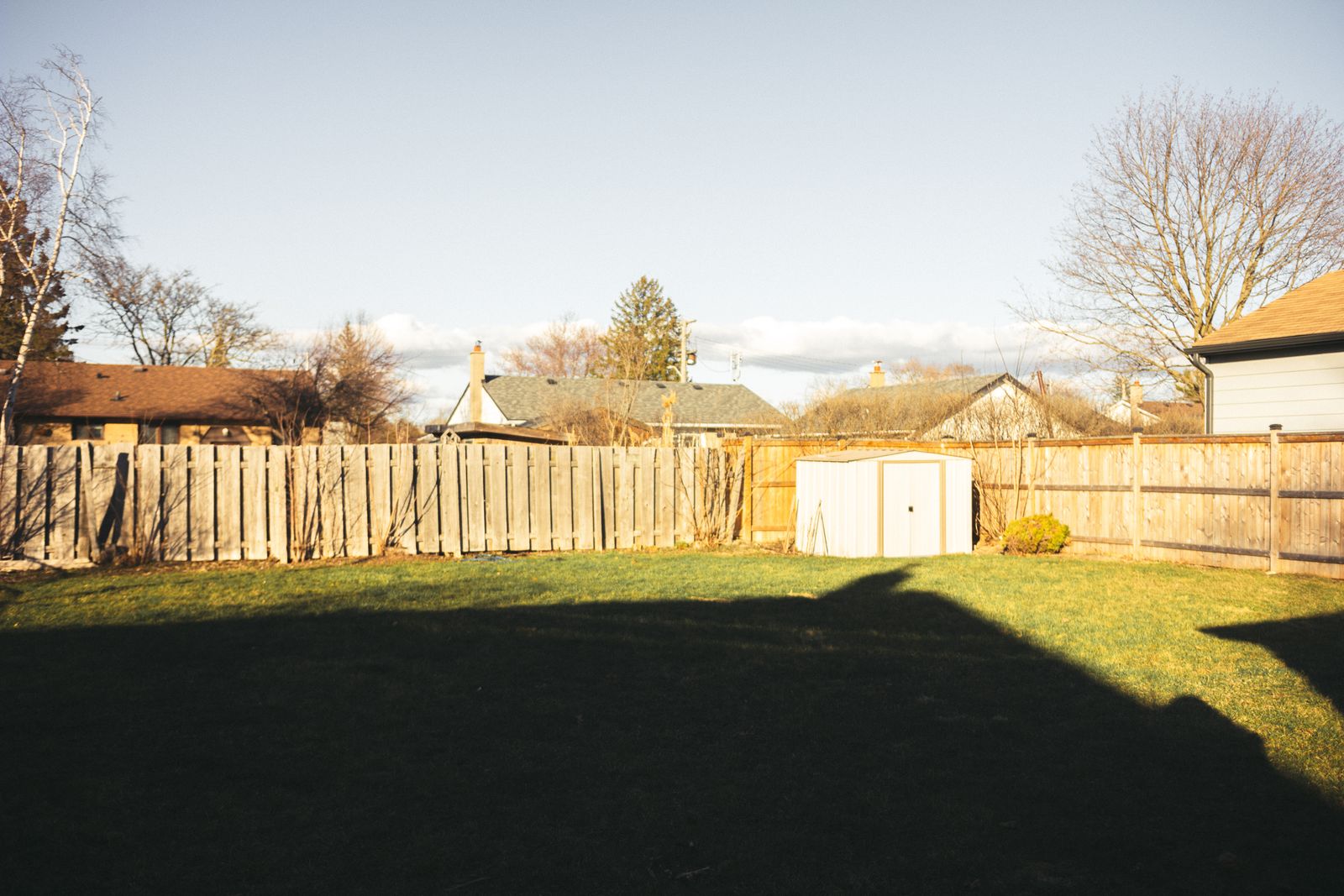 Wood privacy fence in a Suffolk County backyard